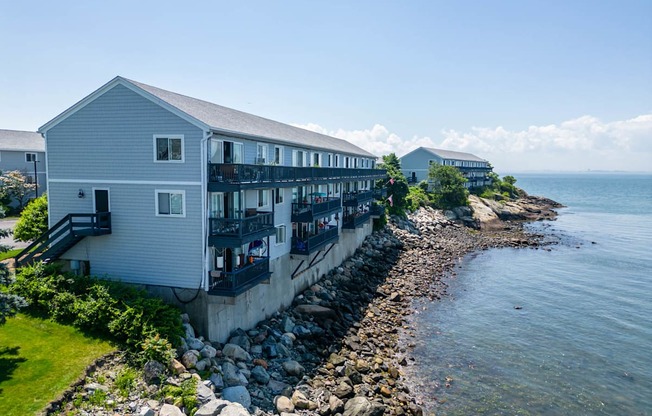 bass point from drone looking at apartments from water