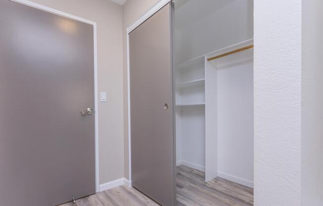 a room with a sink and a mirror