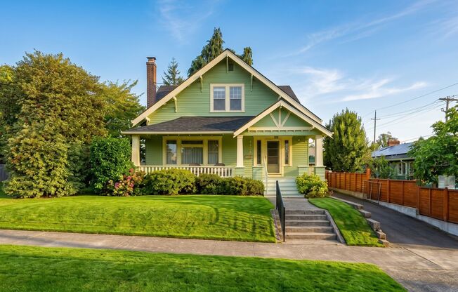 **Half Off the First Full Month of Rent!** Gorgeous Craftsman-Style 5 Bedroom Home Located in the Sought After Roseway Neighborhood!