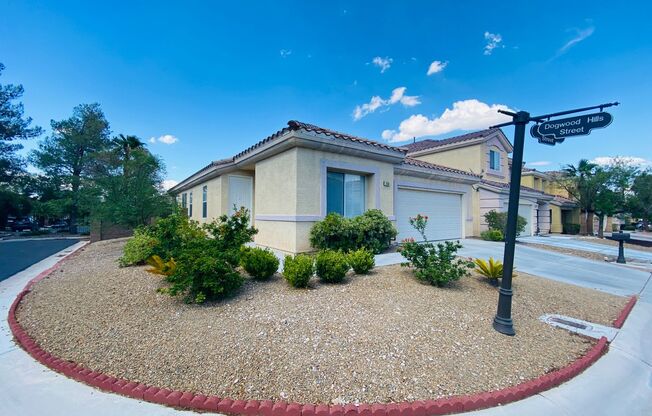 SINGLE STORY HOME INSIDE GUARD GATED RHODES RANCH COMMUNITY WITH FOUR BEDROOMS LOCATED IN A CUL-DE- SAC!