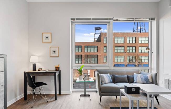 Living Area With Study Table at 23rd Place Apartment, Chicago, IL, 60654