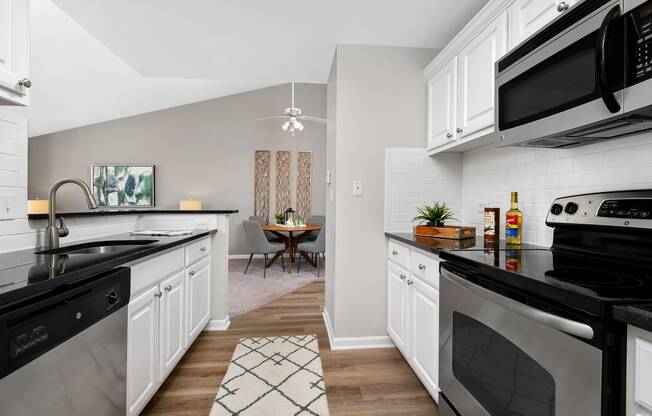 Kitchen with white cabinets