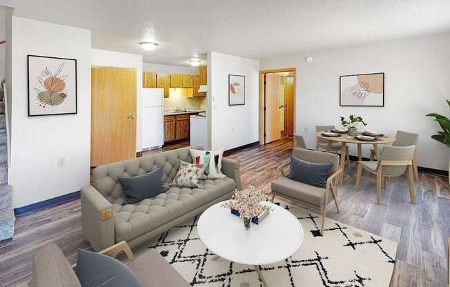 A living room with a grey couch and a coffee table.