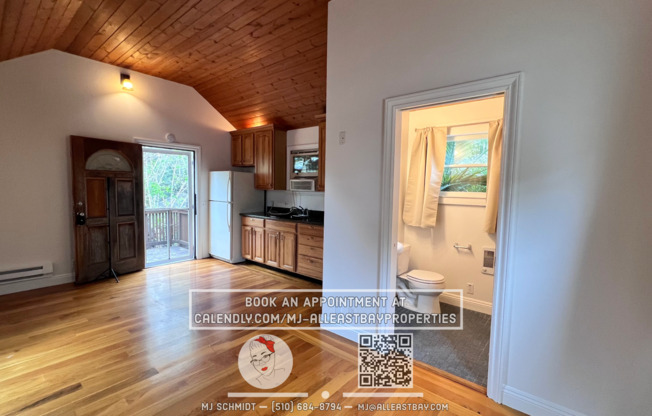 Quaint cottage with hardwood floors, private entrance and patio, surrounded by lush gardens!