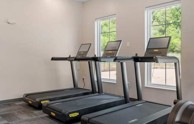 a room with three treadmills at The Lodge at Overland, Minnesota