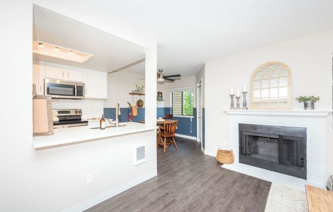 Townhomes with a View Living Room Fire Place, Kitchen, and Dining Room