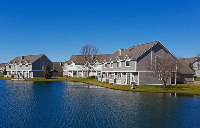 Exterior image of Avalon Cove Townhomes looking out onto the water of the cove.