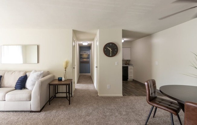 This is a photo of the hallway and kitchen area from the dining area in a 560 square foot, 1 bedroom, 1 bath apartment at Aspen Village Apartments in Cincinnati, OH.