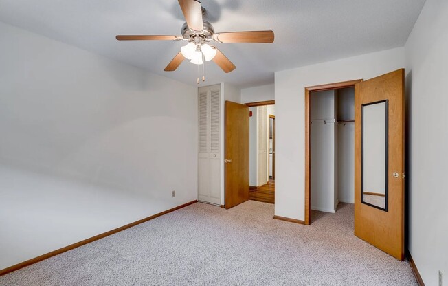 Welcome to Central Lakes of Uptown, where comfort meets convenience. This spacious living area features a ceiling fan and ample closet space for all your needs. Embrace modern living in a vibrant community. Schedule your tour today!