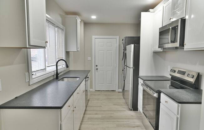 Beautifully Renovated 3 Bedroom with Parking