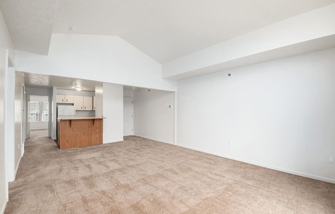 a living room with cathedral ceiling at Black Sand Apartment Homes in Lincoln, NE