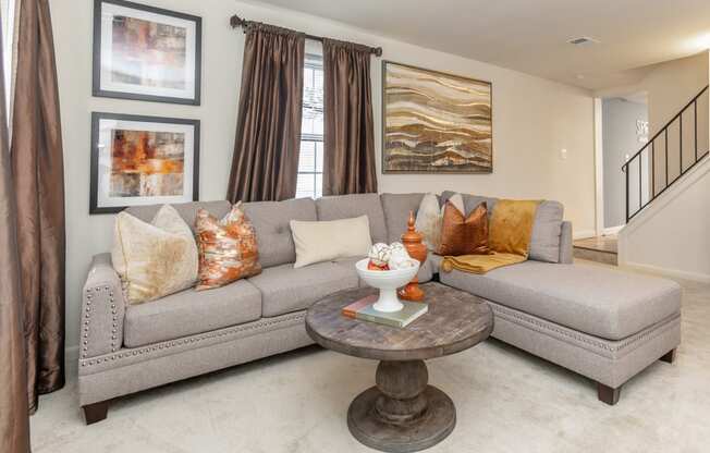 Spacious and bright Spring Hill Townhome living room at Spring Hill Apartments & Townhomes, Maryland, 21234