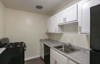 This is a photo of the kitchen in the 543 square foot A-style, 1 bedroom, 1 bath apartment at Blue Grass Manor Apartments in Erlanger, KY.