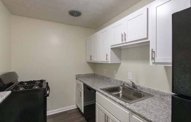 This is a photo of the kitchen in the 543 square foot A-style, 1 bedroom, 1 bath apartment at Blue Grass Manor Apartments in Erlanger, KY.