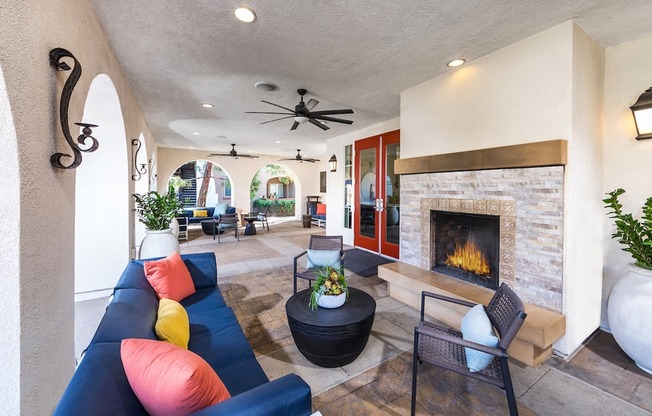 Outdoor resident lounge with a fireplace