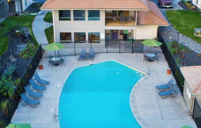 Evergreen Ridge Pool with Lounge Chairs