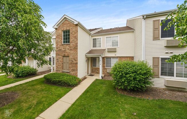 Second Level Condo with Detached Garage