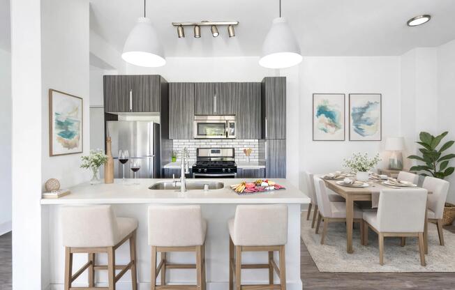 Open kitchen with room for island seating, modern finishes, and a seamless connection to the dining area.
