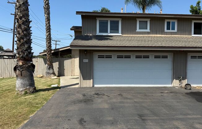 Modern 3 Bedroom, 2.5 Bath Two-Story Townhome with Large Patio & Garage