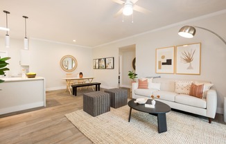 a living room with a couch and a table