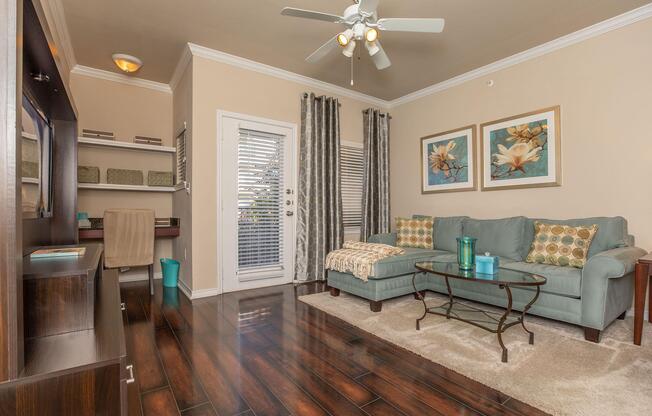 a living room filled with furniture and a fireplace