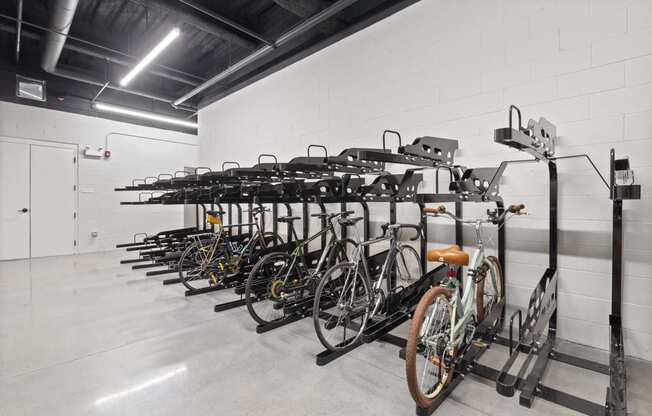 the new bike racks in the new building are filled with bikes