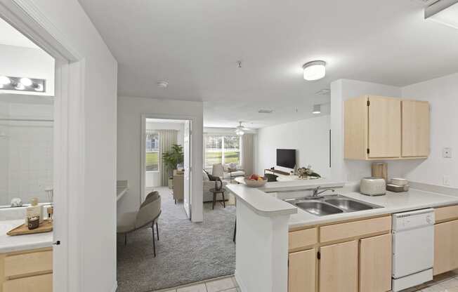 a kitchen and living room in a 555 waverly unit