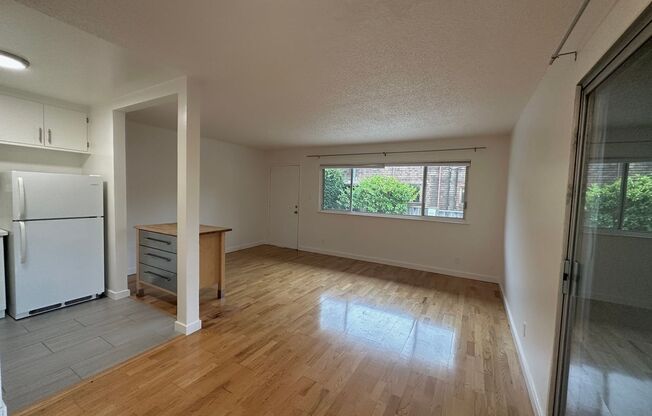 Spacious and Sunlit 2-Bedroom 1-Bath apartment with hardwood floors, private balcony, near Ashby BART