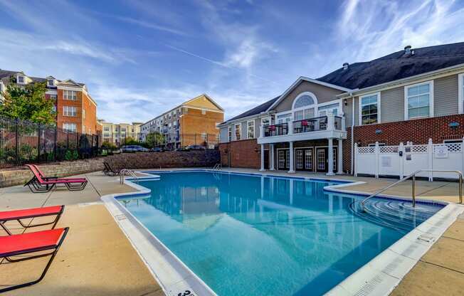 our apartments have a large pool with a blue sky above it at MetroPlace at Town Center, Maryland, 20746