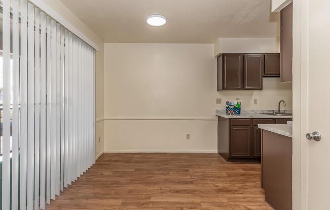 a kitchen with a sink and a refrigerator