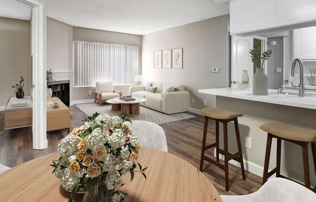 A modern living room with a wooden table and a vase of flowers on it.