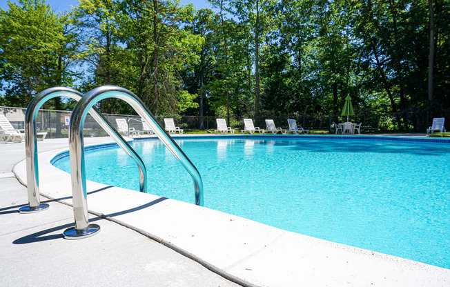 Sparkling Swimming Pool at Woodcrest Apartments in Westland, Michigan