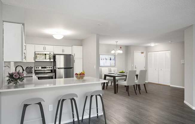 Laurel West End Apartments in Golden Valley, MN photo of kitchen with a view of the dining room