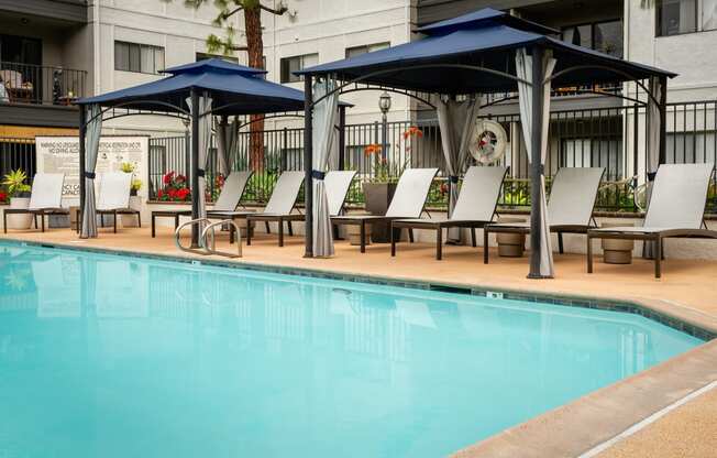 Pool and cabana seating at 55+ FountainGlen Goldenwest, Westminster, CA