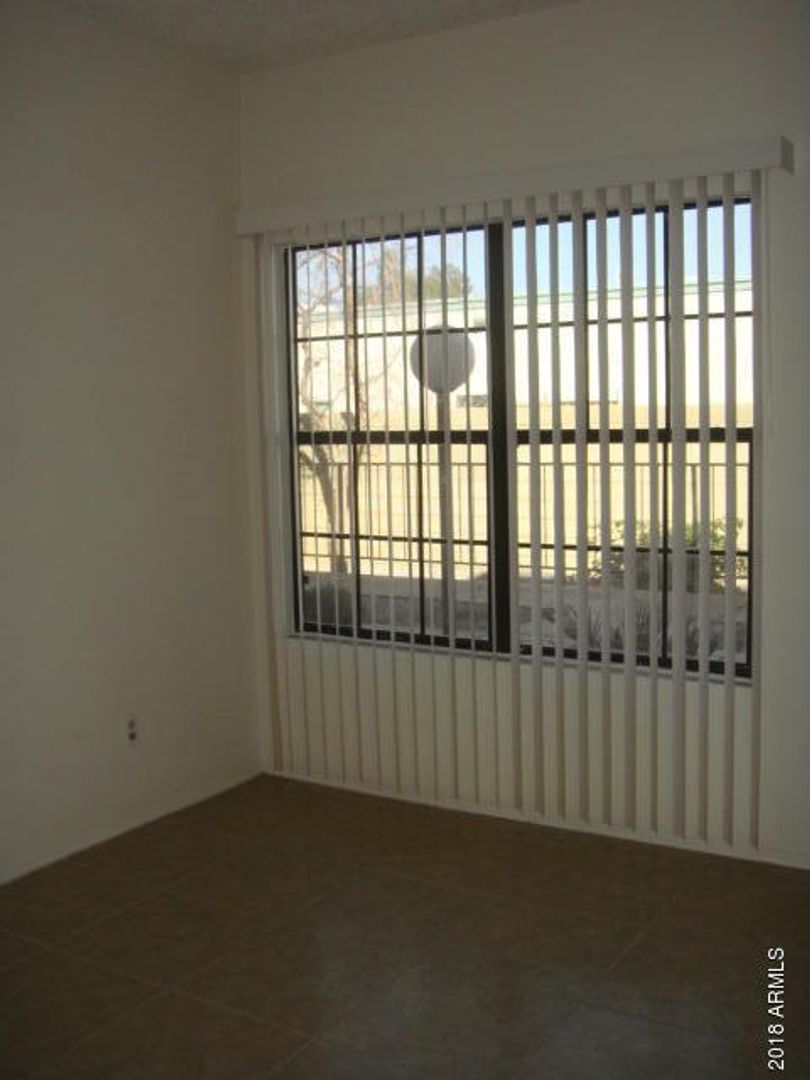 2 BEDROOM 1 BATH DOWNSTAIRS UNIT WITH 1 CAR GARAGE ATTACHED