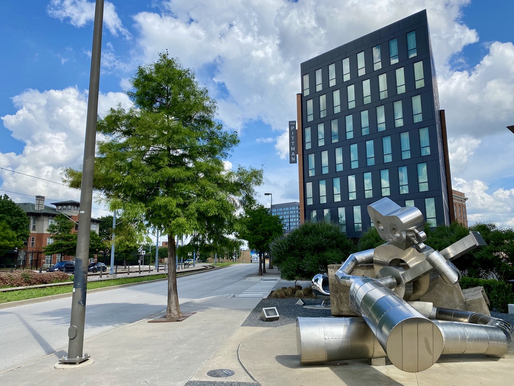 Traveling Man Sculpture in Deep Ellum, TX