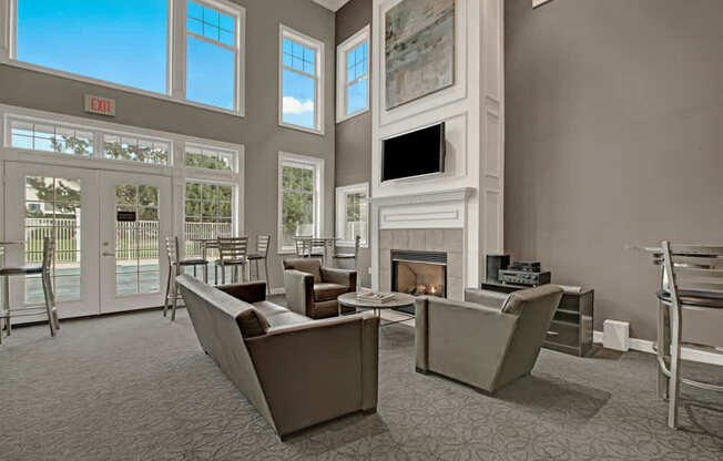 A living room with a fireplace and a couch.