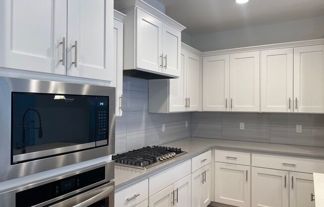NEWER CONSTRUCTION! Beautiful Brand Home Backs to Greenspace! Gourmet Kitchen, Open Landing, Fenced Yard!