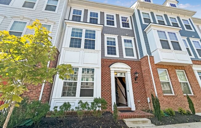 Stunning 4 bedroom townhome with garage