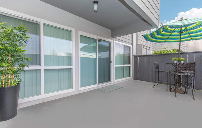 a chair sitting in front of a building