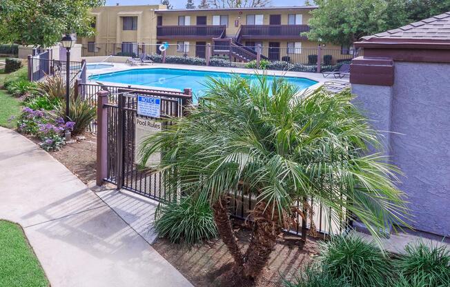 a house with a pool in a garden