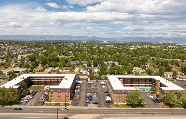 an aerial view of an office building and a parking lot