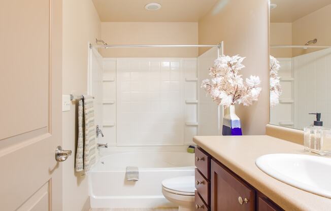 a bathroom with a sink and a toilet and a shower at Sugar House Apartments By Urbana, Salt Lake City, UT, 84105
