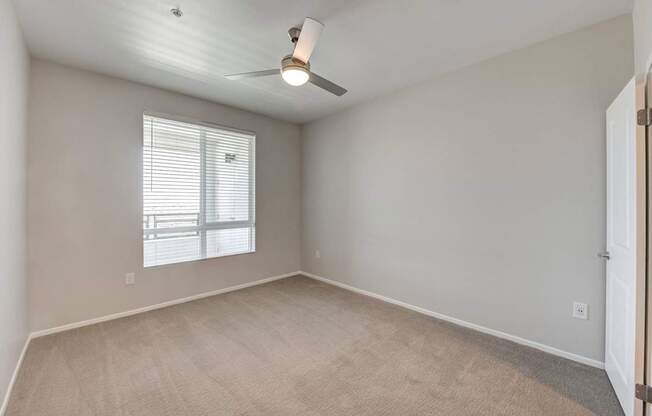 Guest Bedroom with ceiling fan at The Overlook Santa Clarita, CA 91350
