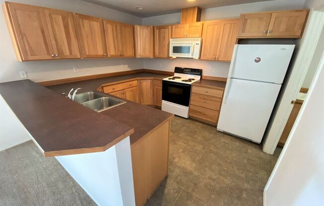 2 Bed, 2 Bath Duplex Near Town with Country Feel