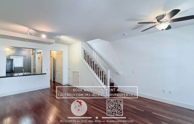 3-bed, 1.5-bath two-story condo, with rich hardwood floors, a modern kitchen, and spacious bedrooms with natural light. located above bustling Bay St. with shopping and restaurants steps away.