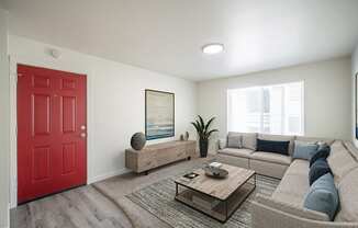 a living room with a red door at Summit, Pocatello