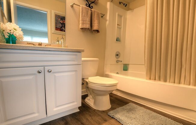 Upgraded bathrooms are fresh and modern.