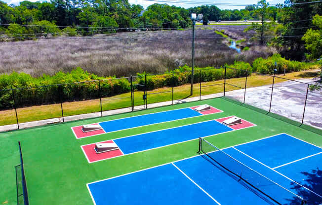 an aerial view of a basketball court on a tennis court