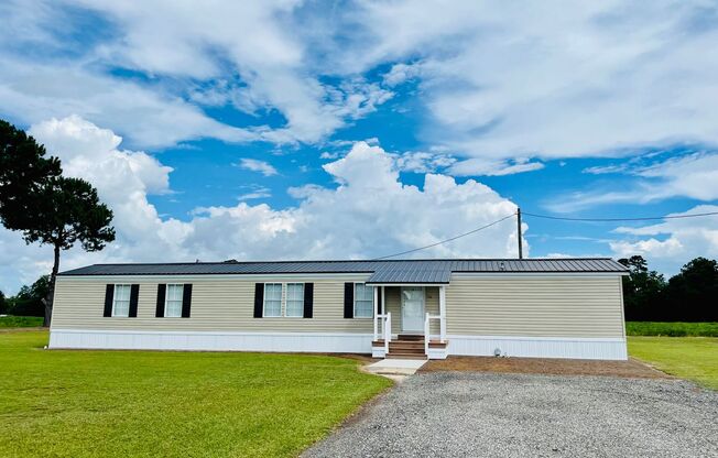 Move in ready!! Privacy and views galore with this 3BD/2BA mobile home in Aynor School District!!